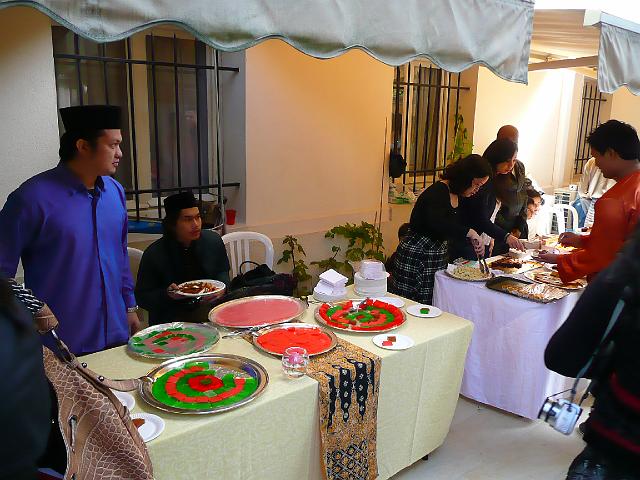 P1120963.JPG - the dessert table manned by volunteer maf committee members and some students