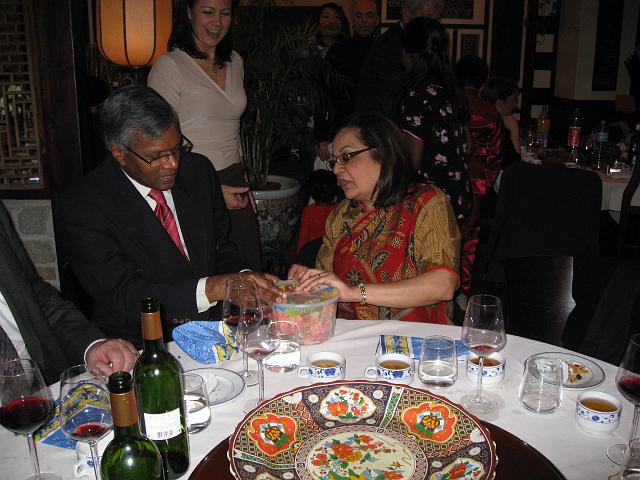 IMG_1182.JPG - Dato' Thanarajasingam and Datin Saradha Iyer opening the box of jelly sweets prior to their counting in the guessing game