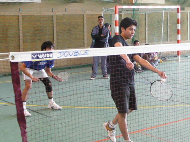 P1070872.JPG - MAF men's doubles, Faizal serving